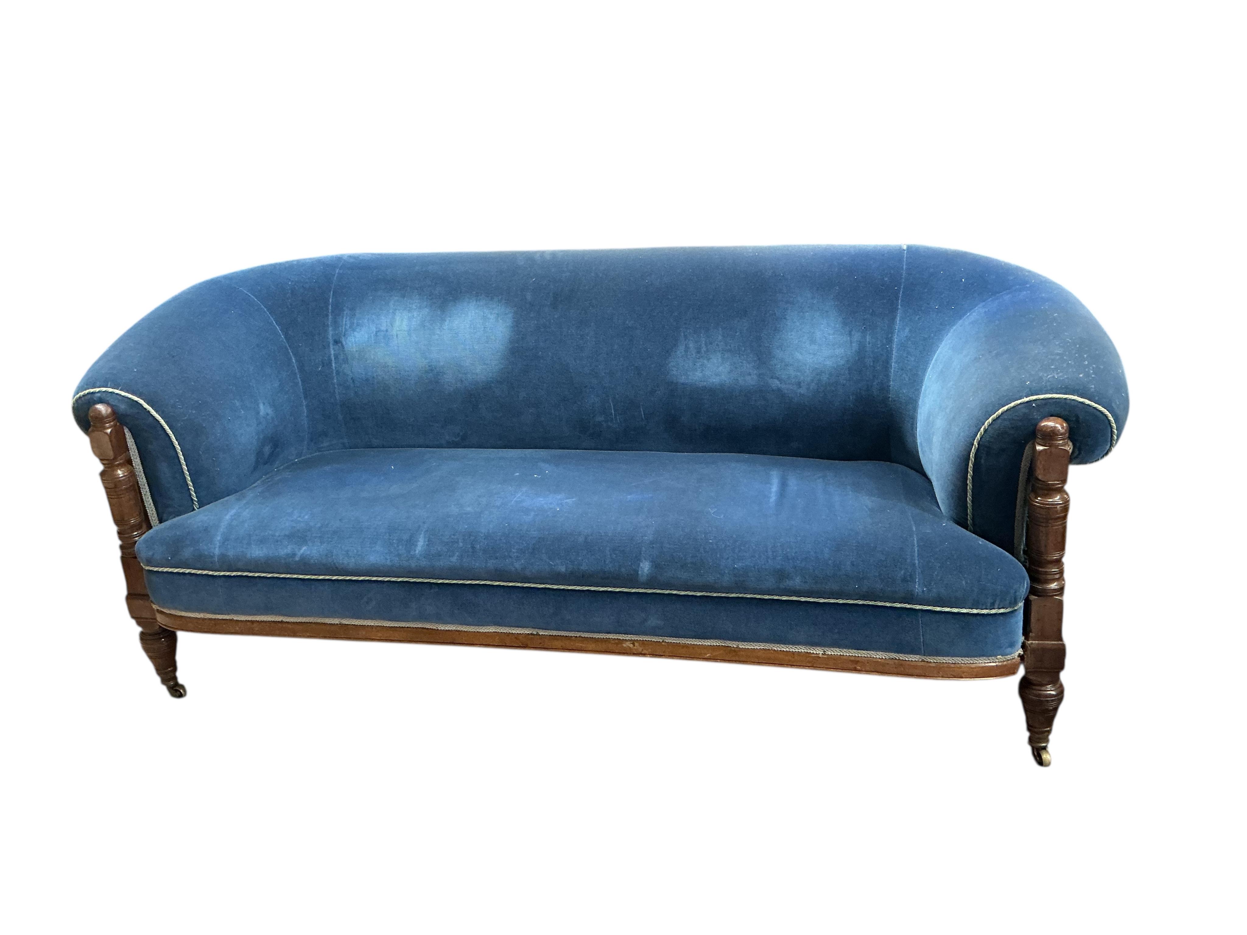 A late Victorian upholstered mahogany settee, width 200cm, depth 86cm, height 76cm.